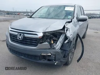 2019 Honda Ridgeline RTL with VIN 5FPYK2F50KB004055, listed as a IAAI auction lot 41576975 with 128,620 mi miles and . Bid and sale history available at DreamBid. Image 6.