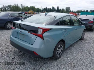2020 Toyota Prius LE with VIN JTDL9RFU1L3017670, listed as a IAAI auction lot 42694974 with 69,298 mi miles and . Bid and sale history available at DreamBid. Image 4.