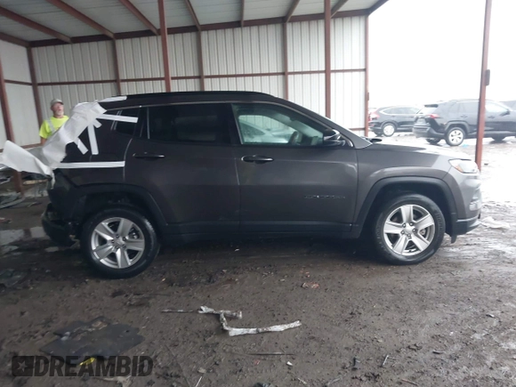 2022 Jeep Compass Latitude with VIN 3C4NJDBB1NT223599, listed as a IAAI auction lot 42181714 with 52,071 mi miles and . Bid and sale history available at DreamBid. Image 13.