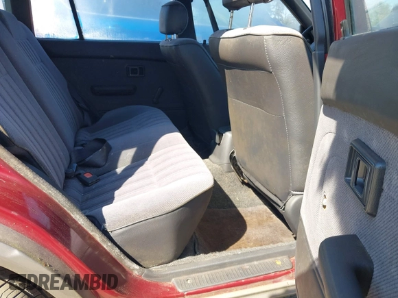 1991 Toyota Corolla z VIN JT2AE94V7M3017214, wystawiony jako IAAI lot #41959814 z przebiegiem 189 458 mil mil oraz . Historia ofert i sprzedaży dostępna na DreamBid. Obrazek 8.
