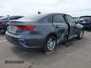 2021 Kia Forte LXS z VIN 3KPF24AD0ME300230, wystawiony jako IAAI lot #42373994 z przebiegiem 60 823 mil mil oraz . Historia ofert i sprzedaży dostępna na DreamBid. Obrazek 4.