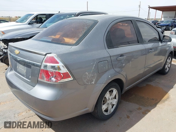 2011 Chevrolet Aveo 1LT with VIN KL1TD5DE6BB114118, listed as a IAAI auction lot 42027581 with 100,633 mi miles and . Bid and sale history available at DreamBid. Image 4.