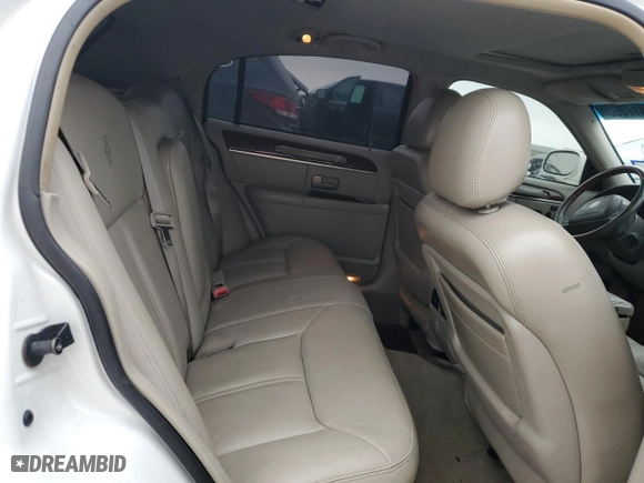 2003 Lincoln Town Car Cartier with VIN 1LNHM83W23Y627418, listed as a Copart auction lot 43817895 with 141,414 mi miles and Salvage Title. Bid and sale history available at carsss.com. Image 10.