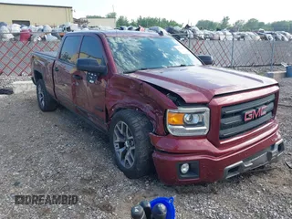 2014 GMC Sierra 1500 SLT with VIN 3GTU2VEC3EG188947, listed as a IAAI auction lot 42452653 with 125,398 mi miles and . Bid and sale history available at DreamBid. Image 1.