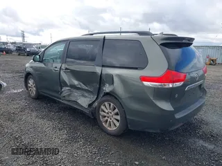 2011 Toyota Sienna XLE with VIN 5TDDK3DCXBS003666, listed as a IAAI auction lot 41807992 with 156,699 mi miles. Bid and sale history available at carsss.com. Image 3.