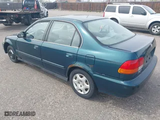 1998 Honda Civic EX with VIN 1HGEJ8640WL018230, listed as a IAAI auction lot 41914209 with 213,939 mi miles. Bid and sale history available at carsss.com. Image 3.