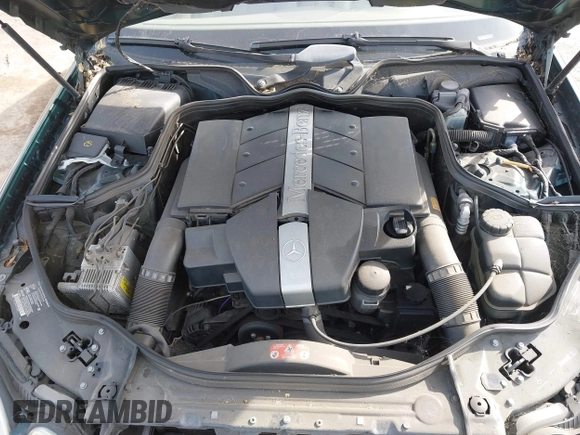 2003 Mercedes-Benz E-Class 3.2L with VIN WDBUF65J23X111728, listed as a IAAI auction lot 41965931 with 85,524 mi miles. Bid and sale history available at carsss.com. Image 10.