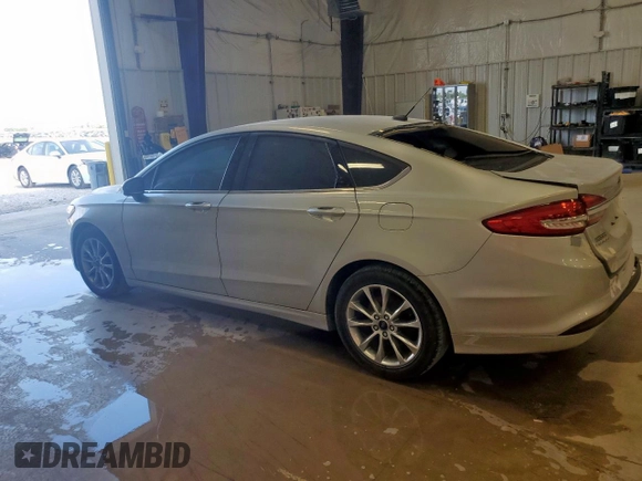 2017 Ford Fusion SE with VIN 3FA6P0HDXHR380057, listed as a Copart auction lot 59583425 with 115,038 mi miles and Salvage title. Bid and sale history available at DreamBid. Image 2.