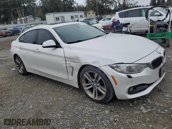 2015 BMW 4 Series 428i with VIN WBA4A5C52FGK15623, listed as a Copart auction lot 49856825 with 144,135 mi miles and Salvage Title. Bid and sale history available at DreamBid. Image 4.