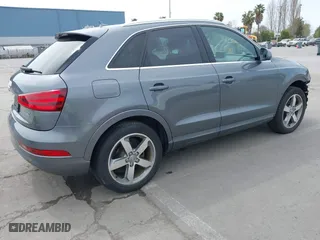 2015 Audi Q3 2.0T Premium Plus with VIN WA1EFCFSXFR009768, listed as a IAAI auction lot 41974476 with 53,013 mi miles. Bid and sale history available at carsss.com. Image 4.