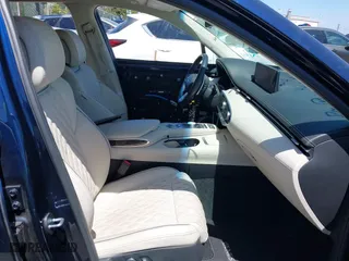 2023 Genesis GV70 3.5T Sport with VIN KMUMCDTC7PU104345, listed as a IAAI auction lot 42019867 with 25,602 mi miles. Bid and sale history available at carsss.com. Image 5.