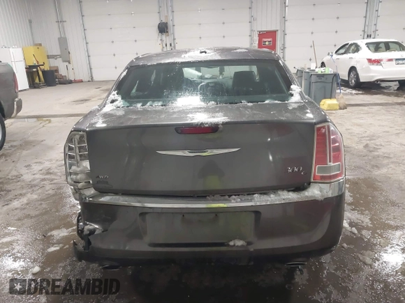 2014 Chrysler 300 C with VIN 2C3CCAKG8EH345577, listed as a IAAI auction lot 41719373 with 152,081 mi miles and . Bid and sale history available at carsss.com. Image 16.