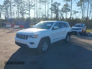 2017 Jeep Grand Cherokee Laredo with VIN 1C4RJFAG7HC688625, listed as a IAAI auction lot 41295860 with 115,714 mi miles. Bid and sale history available at carsss.com. Image 17.