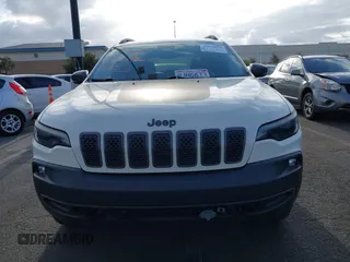 2019 Jeep Cherokee Trailhawk with VIN 1C4PJMBX0KD227083, listed as a IAAI auction lot 42120076 with 118,431 mi miles and . Bid and sale history available at DreamBid. Image 13.