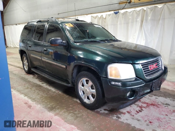 2004 GMC Envoy SLT with VIN 1GKET16S146133921, listed as a Copart auction lot 47730495 with 225,331 mi miles and Salvage Title. Bid and sale history available at DreamBid. Image 4.