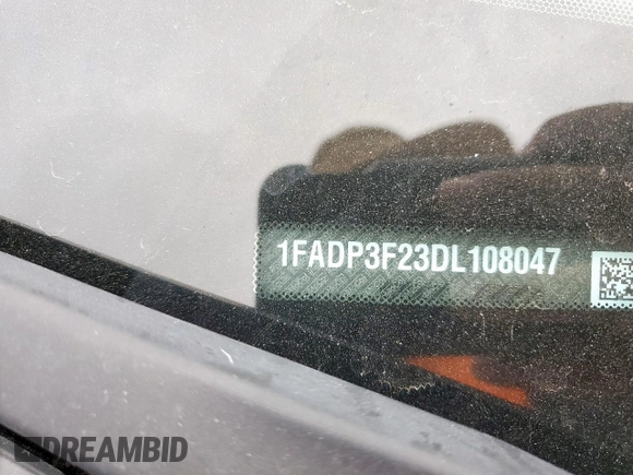 2013 Ford Focus SE z VIN 1FADP3F23DL108047, wystawiony jako Copart lot #57450795 z przebiegiem 67 518 mil mil oraz Szkoda całkowita • Salvage title. Historia ofert i sprzedaży dostępna na DreamBid. Obrazek 12.