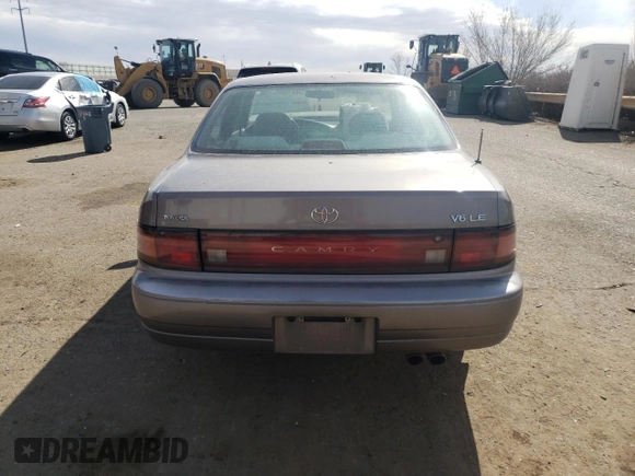 1994 Toyota Camry LE z VIN JT2GK12E2R0050878, wystawiony jako Copart lot #46878005 z przebiegiem 152 211 mil mil oraz Szkoda całkowita • Salvage title. Historia ofert i sprzedaży dostępna na DreamBid. Obrazek 6.