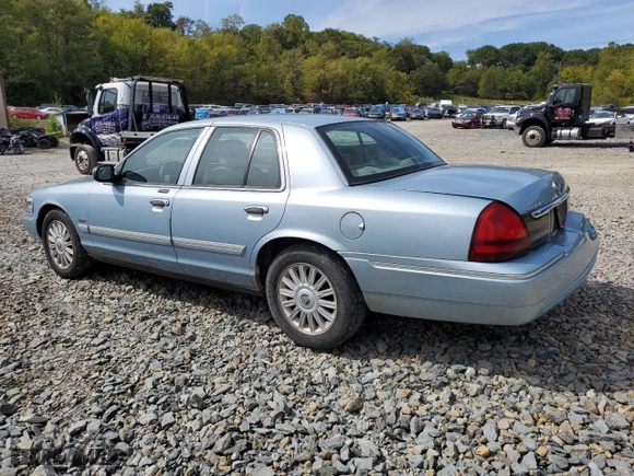 2010 Mercury Grand Marquis LS with VIN 2MEBM7FV7AX627417, listed as a Copart auction lot 71925754 with 127,918 mi miles and Salvage Title. Bid and sale history available at carsss.com. Image 2.