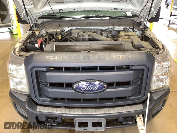 2014 Ford F-350 XL z VIN 1FTBF3A65EEB30118, wystawiony jako IAAI lot #42731343 z przebiegiem 114 298 mil mil oraz . Historia ofert i sprzedaży dostępna na DreamBid. Obrazek 26.