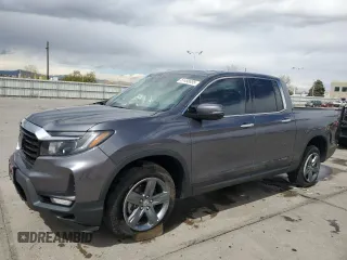 2023 Honda Ridgeline RTL-E with VIN 5FPYK3F78PB010961, listed as a Copart auction lot 51458635 with 33,508 mi miles and Salvage title. Bid and sale history available at DreamBid. Image 1.
