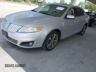 2009 Lincoln MKS with VIN 1LNHM93R49G604737, listed as a IAAI auction lot 42180706 with 131,856 mi miles and . Bid and sale history available at DreamBid. Image 2.