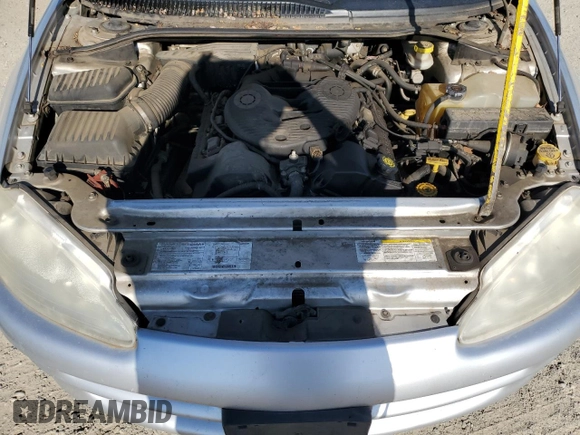 2004 Dodge Intrepid SE z VIN 2B3AD46R54H710035, wystawiony jako Copart lot #58865685 z przebiegiem 74 018 mil mil oraz Czysty tytuł • Clean title. Historia ofert i sprzedaży dostępna na DreamBid. Obrazek 11.