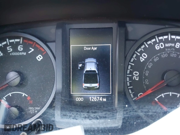 2023 Toyota Tacoma SR with VIN 3TMCZ5AN0PM614127, listed as a IAAI auction lot 41974924 with 12,674 mi miles and . Bid and sale history available at DreamBid. Image 7.