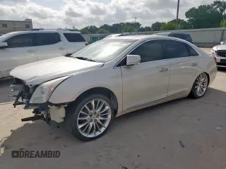 2014 Cadillac XTS Platinum z VIN 2G61W5S89E9145914, wystawiony jako Copart lot #61942215 z przebiegiem 68 268 mil mil oraz Czysty tytuł • Clean title. Historia ofert i sprzedaży dostępna na DreamBid. Obrazek 1.