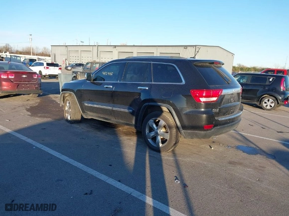 2012 Jeep Grand Cherokee Limited with VIN 1C4RJFBG2CC332218, listed as a IAAI auction lot 41029135 with 198,675 mi miles. Bid and sale history available at carsss.com. Image 3.