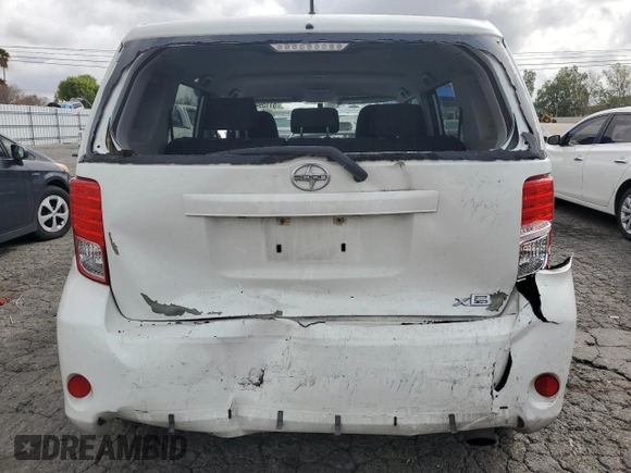 2014 Scion xB with VIN JTLZE4FE2EJ059270, listed as a Copart auction lot 51159405 with 130,803 mi miles and Salvage Title. Bid and sale history available at carsss.com. Image 6.
