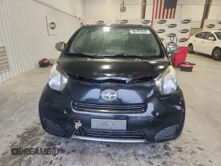 2012 Scion iQ z VIN JTNJJXB04CJ012587, wystawiony jako Copart lot #58191845 z przebiegiem 104 601 mil mil oraz Szkoda całkowita • Salvage title. Historia ofert i sprzedaży dostępna na DreamBid. Obrazek 5.