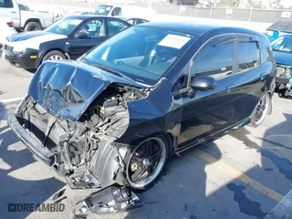 2007 Honda Fit with VIN JHMGD38497S060481, listed as a IAAI auction lot 41611633 with 128574 miles. Bid and sale history available at carsss.com. Image 16.