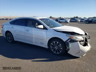 2016 Toyota Avalon Hybrid XLE Premium with VIN 4T1BD1EB7GU056738, listed as a Copart auction lot 77008243 with 130,760 mi miles. Bid and sale history available at carsss.com. Image 4.