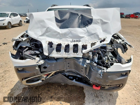 2020 Jeep Cherokee Trailhawk z VIN 1C4PJMBN0LD553823, wystawiony jako Copart lot #59796745 z przebiegiem 101 916 mil mil oraz Szkoda całkowita • Salvage title. Historia ofert i sprzedaży dostępna na DreamBid. Obrazek 5.
