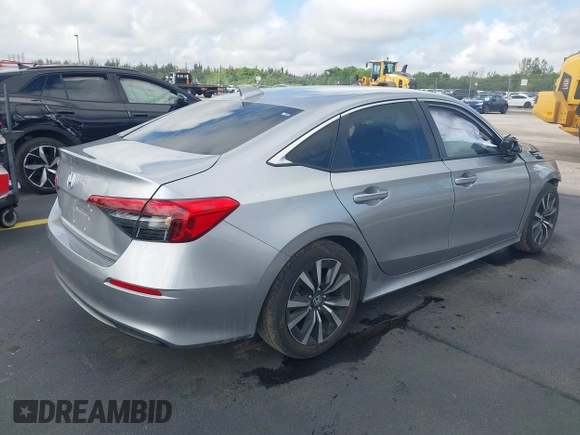 2023 Honda Civic EX z VIN 2HGFE1F79PH303727, wystawiony jako IAAI lot #42251695 z przebiegiem 21 071 mil mil oraz . Historia ofert i sprzedaży dostępna na DreamBid. Obrazek 4.