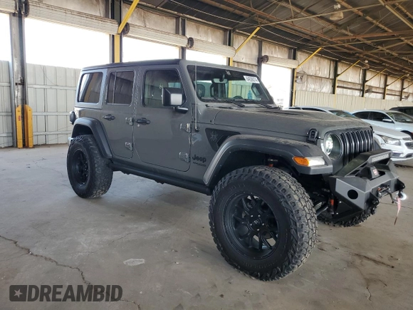 2022 Jeep Wrangler Unlimited High Tide with VIN 1C4HJXDG2NW221829, listed as a Copart auction lot 64836074 with 3,394 mi miles and Salvage Title. Bid and sale history available at DreamBid. Image 4.