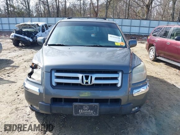 2007 Honda Pilot EX-L with VIN 5FNYF28737B001928, listed as a IAAI auction lot 41311134 with 243,870 mi miles. Bid and sale history available at carsss.com. Image 12.
