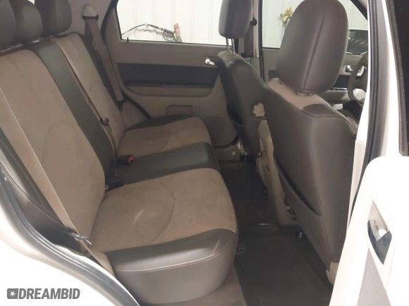 2011 Mercury Mariner Premier with VIN 4M2CN9HG3BKJ02026, listed as a IAAI auction lot 40254703 with 99,000 mi miles. Bid and sale history available at carsss.com. Image 8.