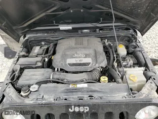 2015 Jeep Wrangler Unlimited Sport with VIN 1C4HJWDG9FL598249, listed as a Copart auction lot 49775035 with 116,486 mi miles and Salvage Title. Bid and sale history available at carsss.com. Image 13.