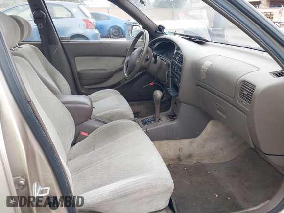 1994 Toyota Camry LE with VIN JT2SK12E0R0269820, listed as a IAAI auction lot 41908360 with 184,739 mi miles. Bid and sale history available at carsss.com. Image 5.