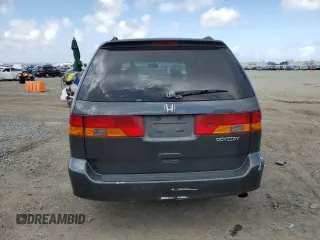 2004 Honda Odyssey EX-L with VIN 5FNRL18944B052617, listed as a Copart auction lot 51443625 with 144,346 mi miles and Salvage Title. Bid and sale history available at DreamBid. Image 6.