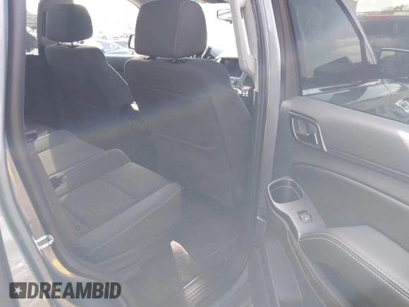 2019 Chevrolet Tahoe Commercial z VIN 1GNSKFKC0KR142979, wystawiony jako IAAI lot #41532380 z przebiegiem 143 423 mil mil oraz . Historia ofert i sprzedaży dostępna na DreamBid. Obrazek 8.