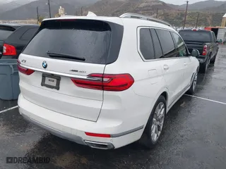 2019 BMW X7 xDrive40i with VIN 5UXCW2C57KL084137, listed as a IAAI auction lot 41662958 with 34,751 mi miles. Bid and sale history available at carsss.com. Image 4.