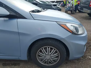 2014 Hyundai Accent GS with VIN KMHCT5AE1EU147015, listed as a IAAI auction lot 41659497 with 147,832 mi miles. Bid and sale history available at carsss.com. Image 14.