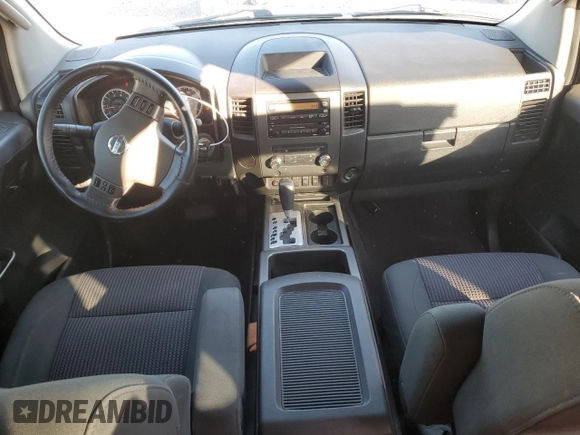 2010 Nissan Titan SE with VIN 1N6AA0CA5AN308613, listed as a Copart auction lot 82812894 with 98,887 mi miles and Salvage Title. Bid and sale history available at carsss.com. Image 8.