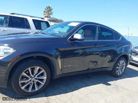 2017 BMW X6 sDrive35i with VIN 5UXKU0C34H0G69291, listed as a IAAI auction lot 41670871 with 73,977 mi miles. Bid and sale history available at carsss.com. Image 14.