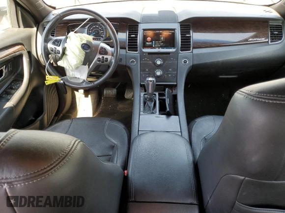 2015 Ford Taurus Limited с VIN 1FAHP2F84FG106058, выставлен на аукционе Copart как лот 57621355 с пробегом 130 582 миль миль и Списание • Salvage title. История ставок и продаж доступна на DreamBid. Изображение 8.