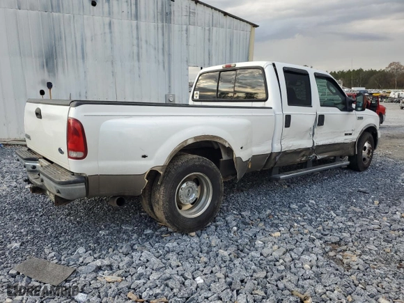 2005 Ford Super Duty F-350 DRW XL with VIN 1FTWW32P55EA54456, listed as a Copart auction lot 84890534 with 128,220 mi miles and Salvage Title. Bid and sale history available at carsss.com. Image 3.