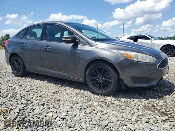 2016 Ford Focus SE with VIN 1FADP3F29GL233719, listed as a Copart auction lot 56857705 with 140,785 mi miles and Salvage title. Bid and sale history available at DreamBid. Image 4.