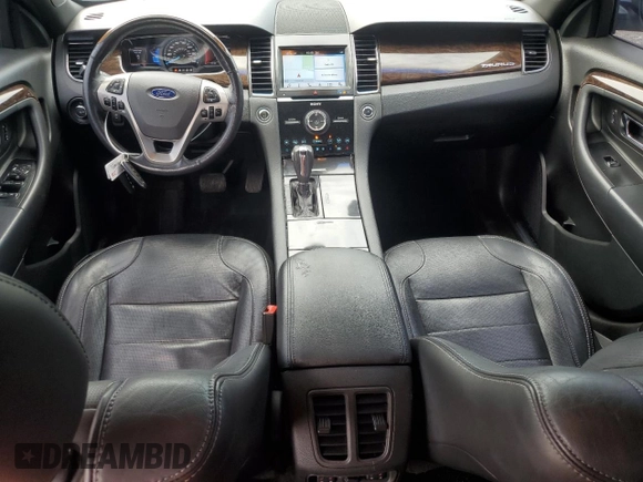 2014 Ford Taurus Limited with VIN 1FAHP2F88EG102674, listed as a Copart auction lot 62841285 with 107,378 mi miles and Salvage title. Bid and sale history available at DreamBid. Image 8.